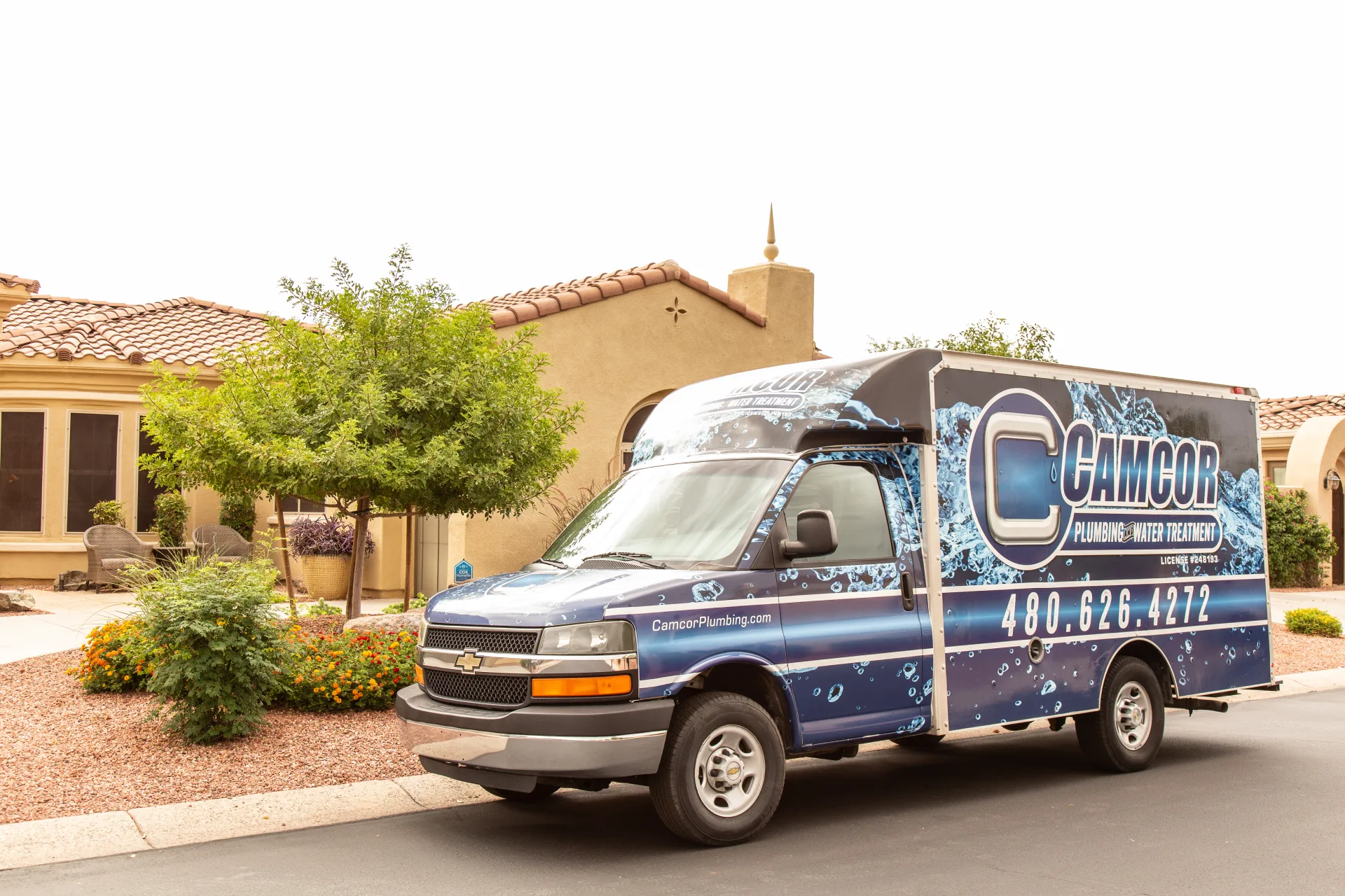 Camcor Plumbing service truck on a job in Mesa, AZ
