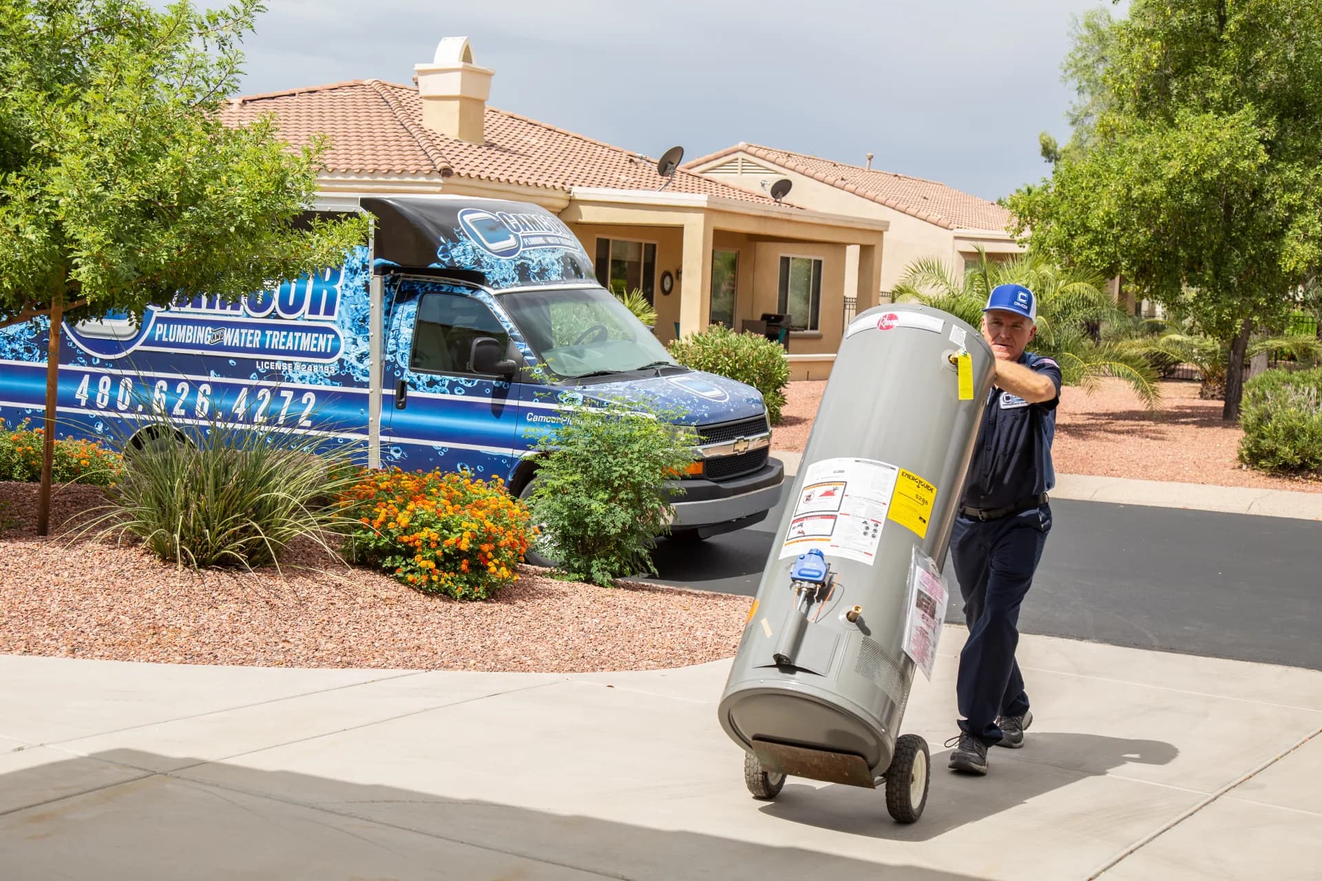 Camcor crew delivering a new water heater